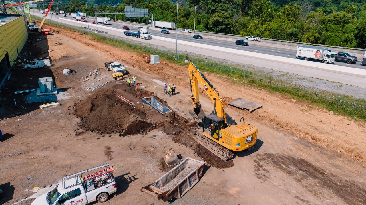 about-us-02 An aerial view capturing heavy machinery at a Chattanooga construction site.